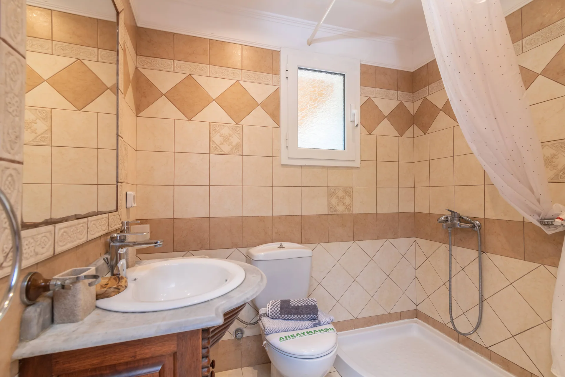 Villa bathroom with warm natural light