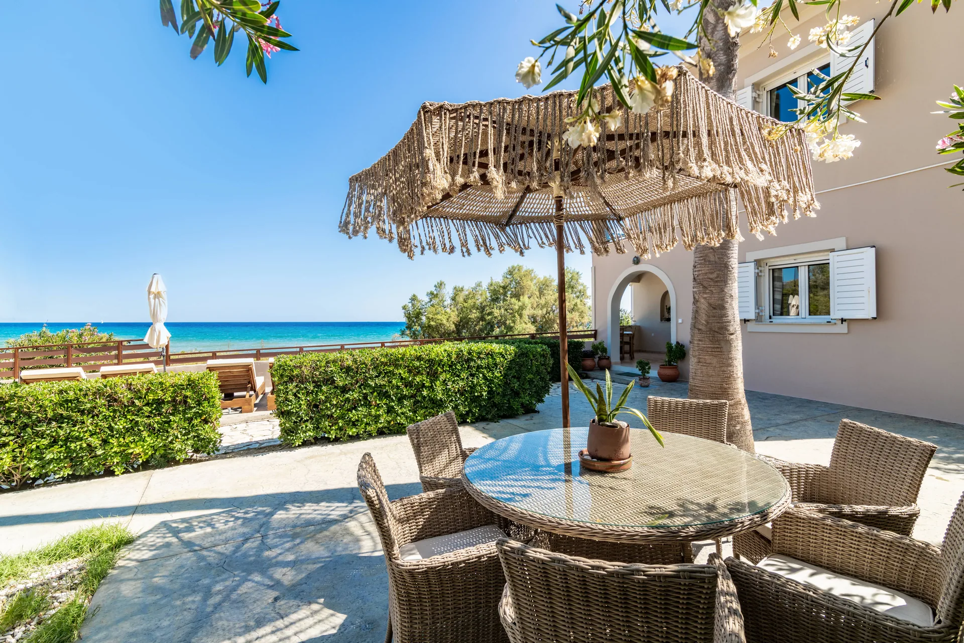 Outdoor dining terrace with an Ionian Sea view